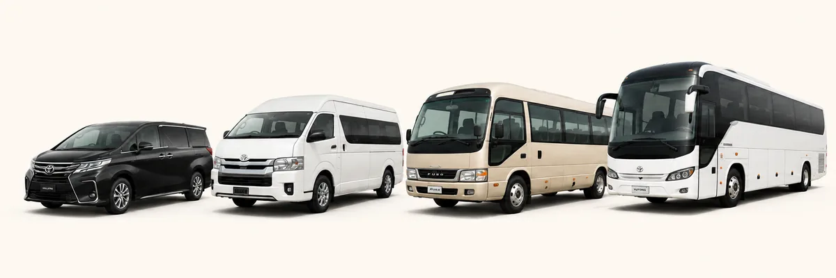 Bus World passenger vans and coaches ready for a Dubai to Abu Dhabi private tour.