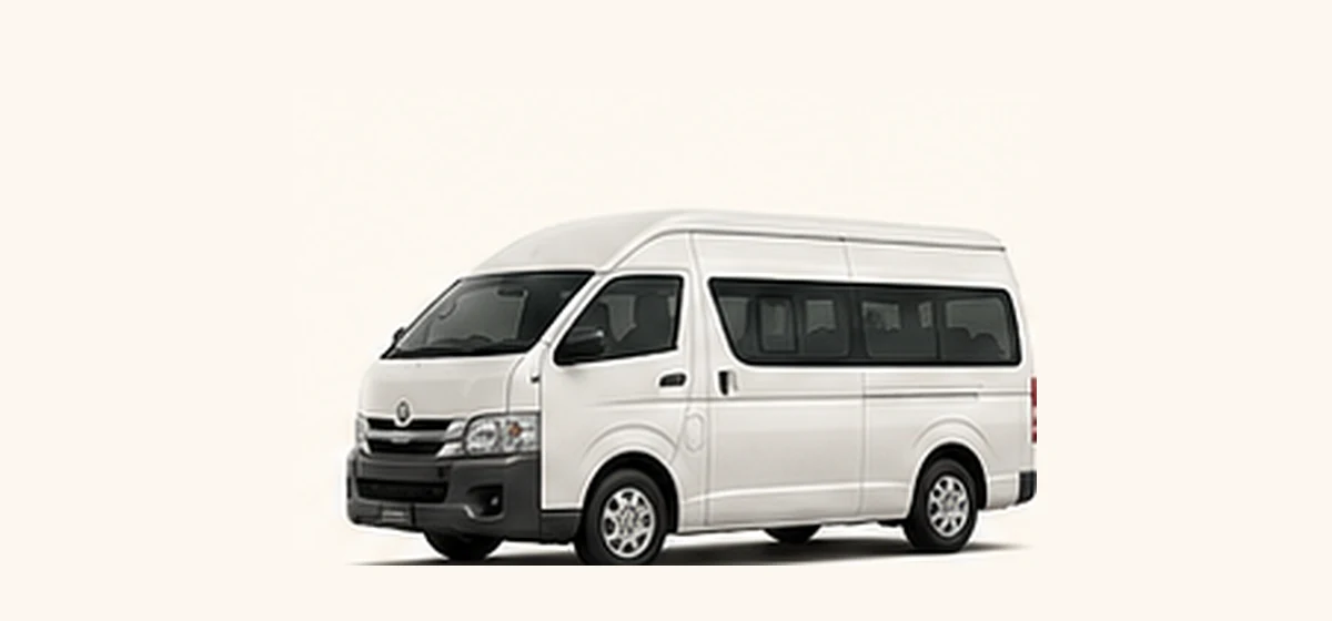 White passenger van suitable for groups of eight to fourteen