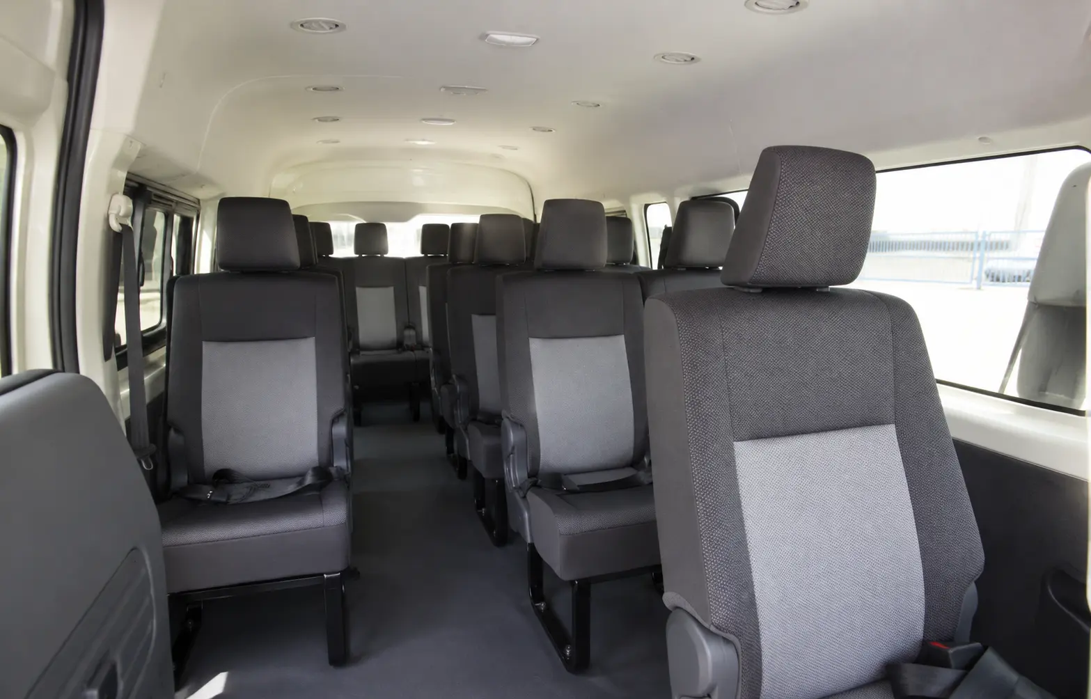 Passenger cabin and comfort features inside a 12 seater van