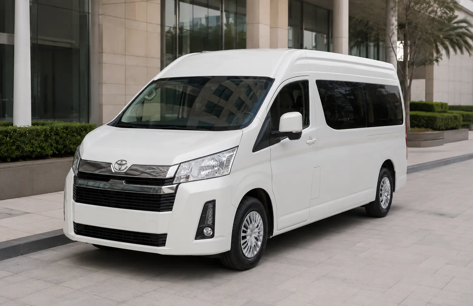 Front exterior view of a 12 seater passenger van in Abu Dhabi