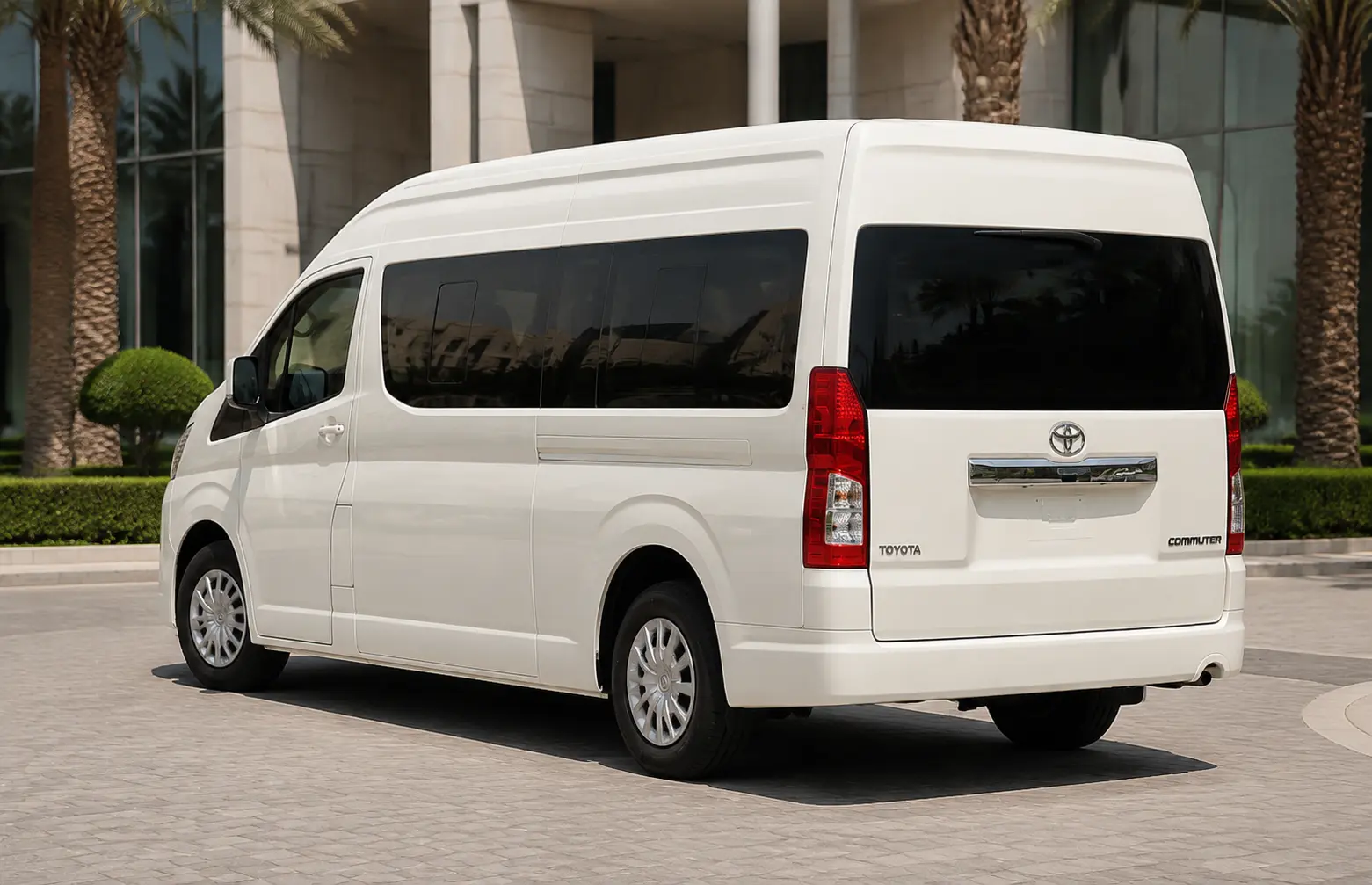 Side view of a 12 seater passenger van used for group transport in Abu Dhabi