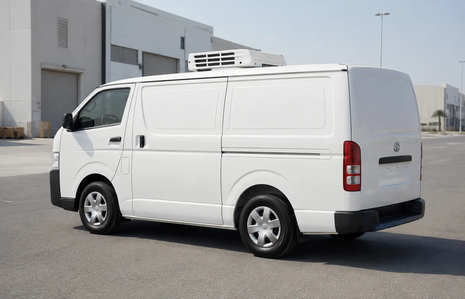 Side view of a refrigerated chiller van used for cold-chain transport in Dubai