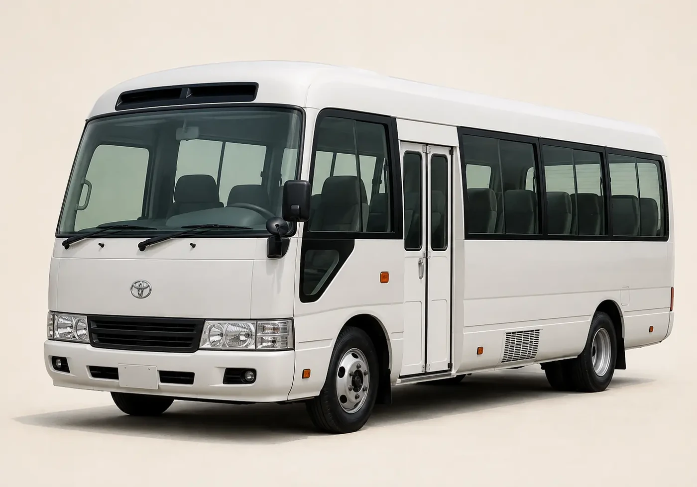 Toyota Coaster passenger bus shown as a minibus comparison option